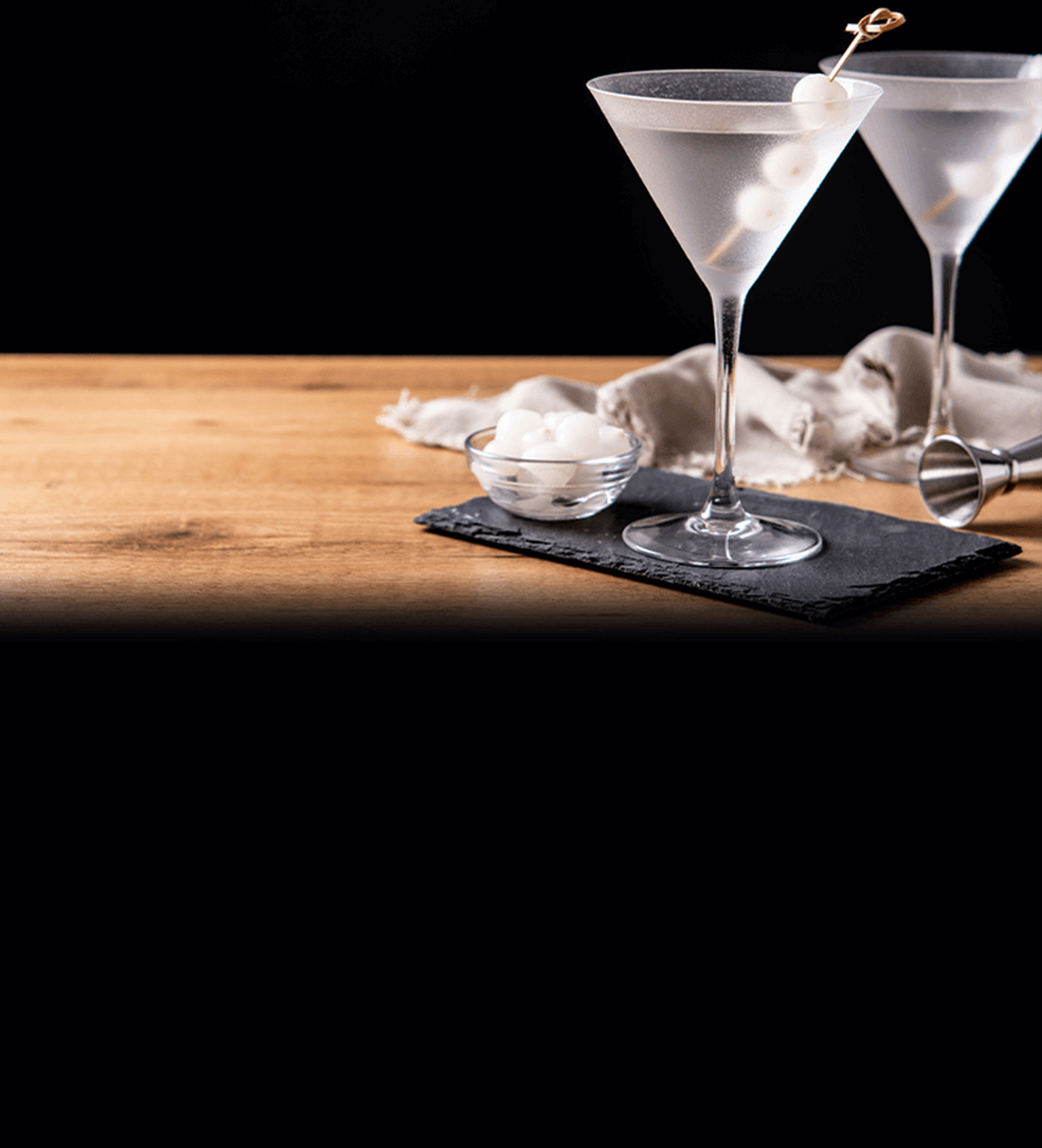 Image of a Gibson martini on a butcher block counter